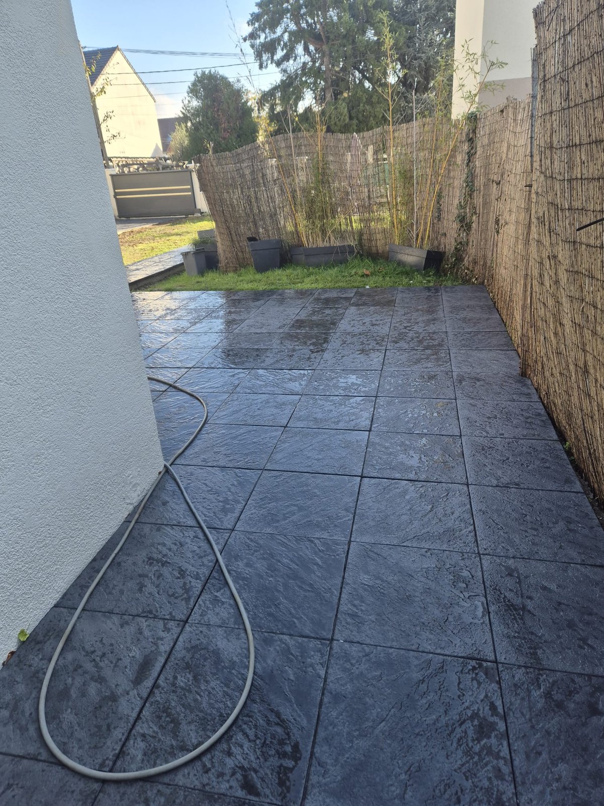 Pose de carrelage extérieur grand format ardoise